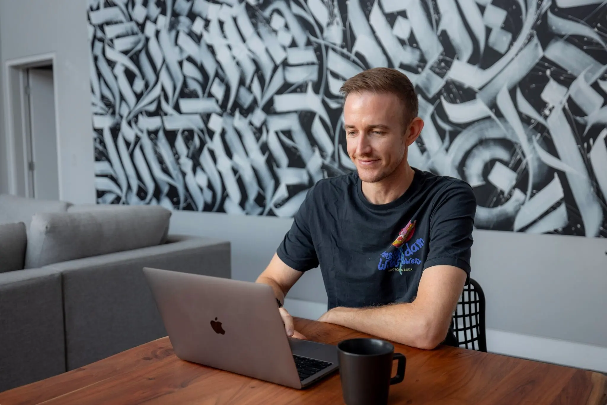 Blogger Stock Photo Ryan Robinson at Computer